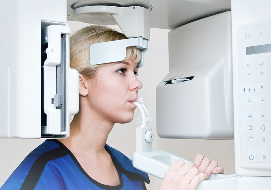 Dentist showing patient dental patient education software