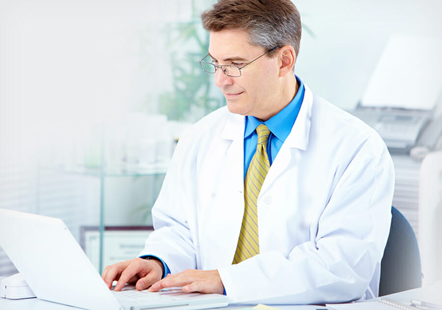 Dentist showing patient dental patient education software